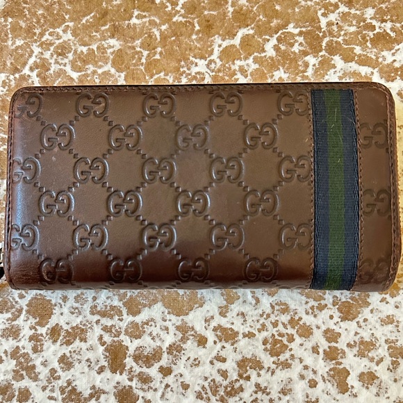 Gucci Handbags - GUCCI Brown Leather Monogram W/ Blue and Green Nylon Strap Zippy Wallet